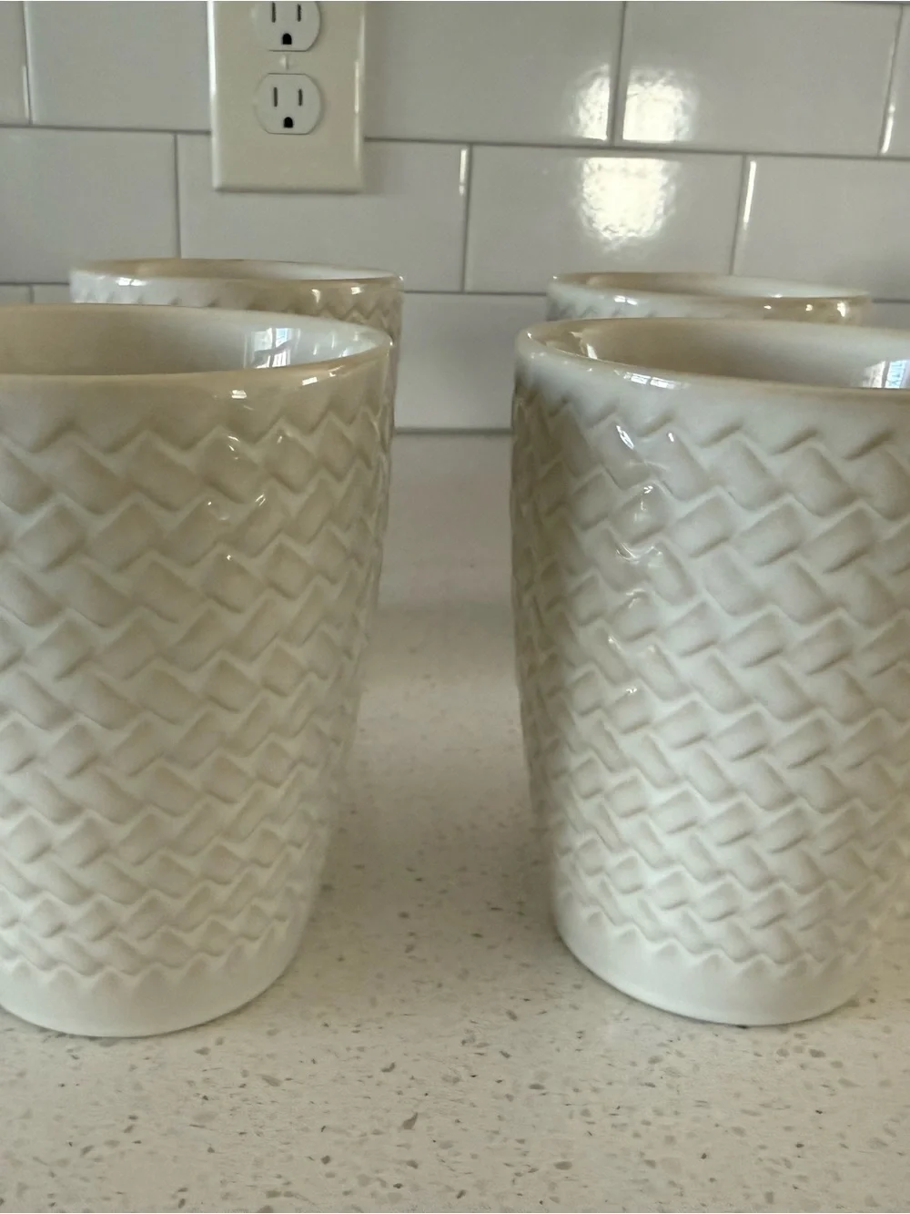 4 white basketweave Crate and Barrel mugs
